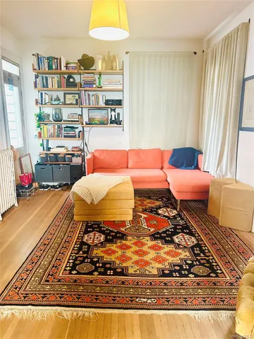 a dining room with a table and chairs