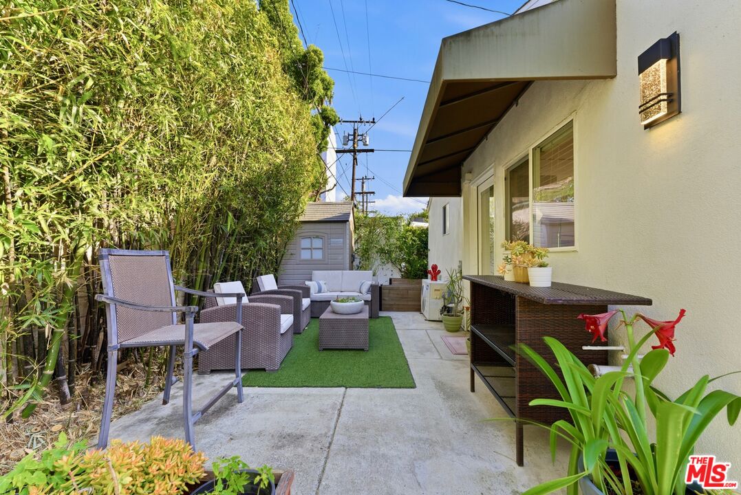 132 North Carson Road, Unit A Beverly Hills, CA 90211 - Photo 1 of 14 a view of backyard of house with seating area