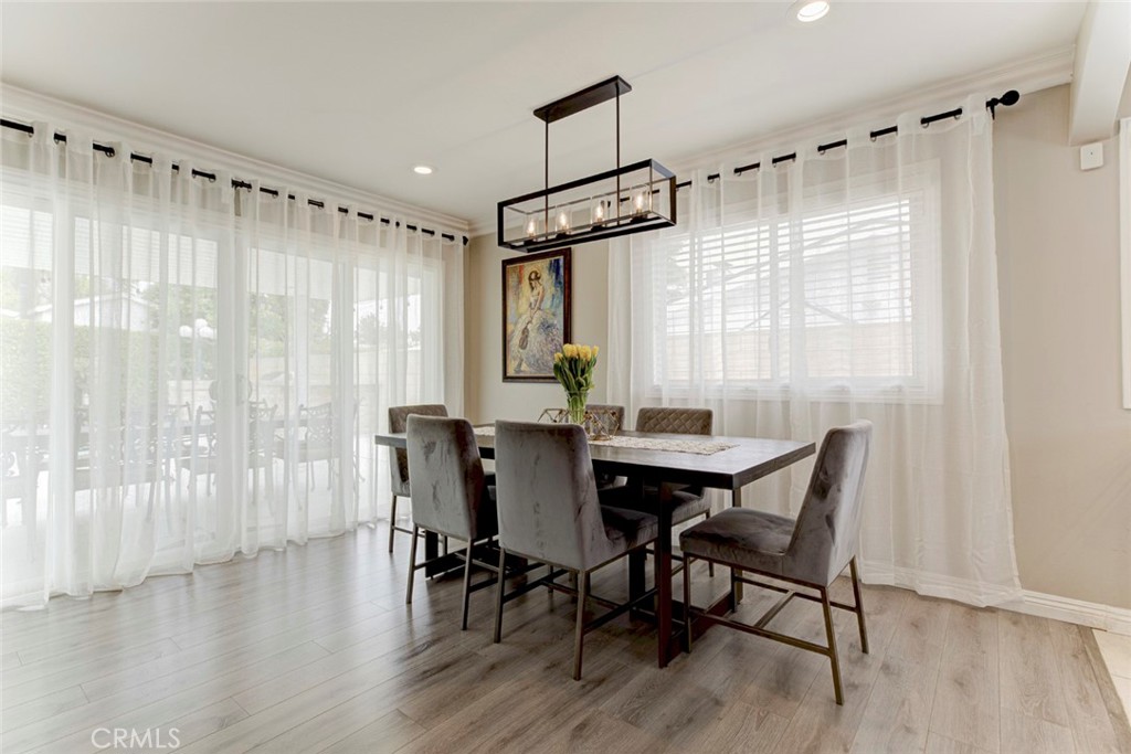 9350 Rhea Avenue Northridge, CA 91324 - Photo 4 of 20 a view of a dining room with furniture window and wooden floor