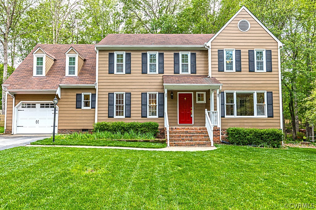 14209 Long Hill Road Midlothian, VA 23112 - Photo 1 of 50 a front view of a house with a yard