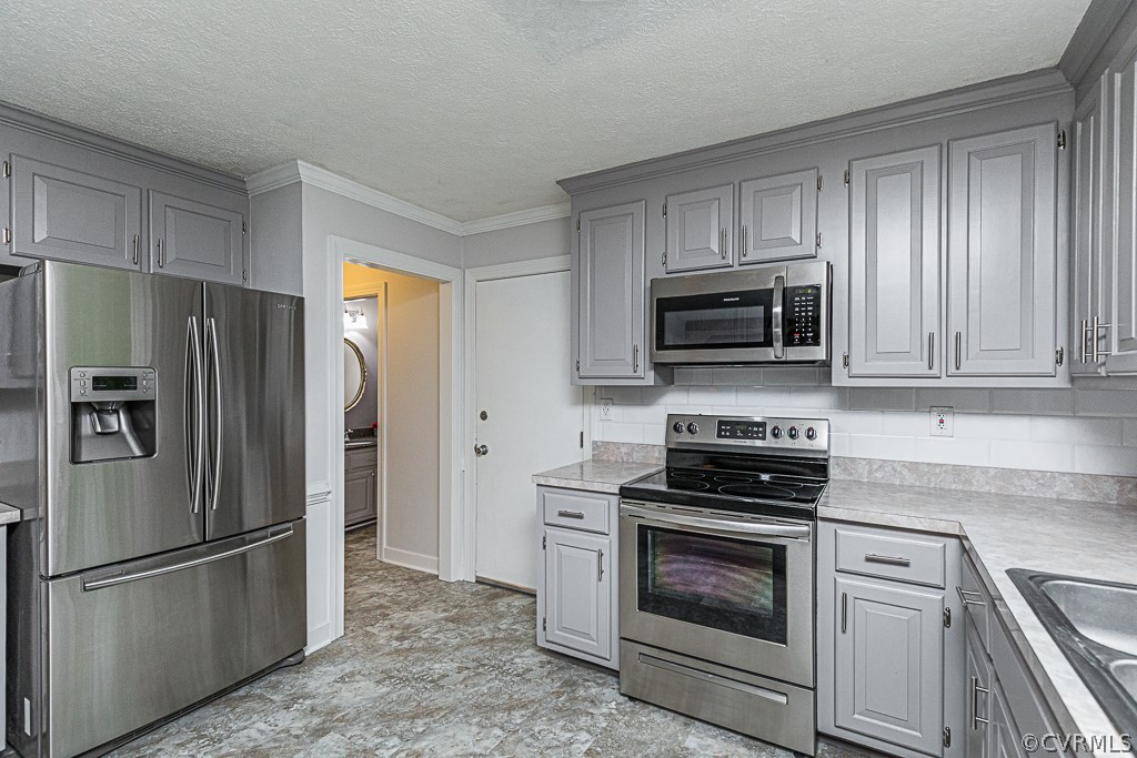 14209 Long Hill Road Midlothian, VA 23112 - Photo 18 of 50 a kitchen with cabinets stainless steel appliances and a window