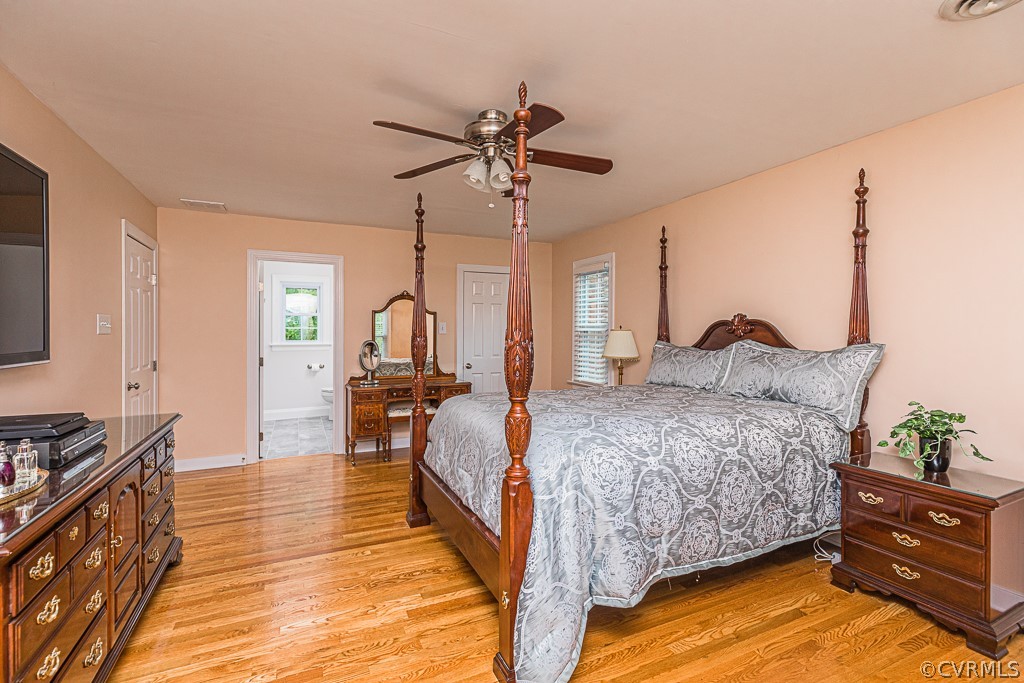 14209 Long Hill Road Midlothian, VA 23112 - Photo 26 of 50 a bed room with a bed and dresser