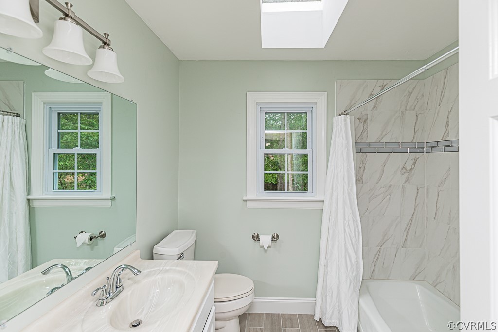 14209 Long Hill Road Midlothian, VA 23112 - Photo 39 of 50 a bathroom with a sink toilet and shower