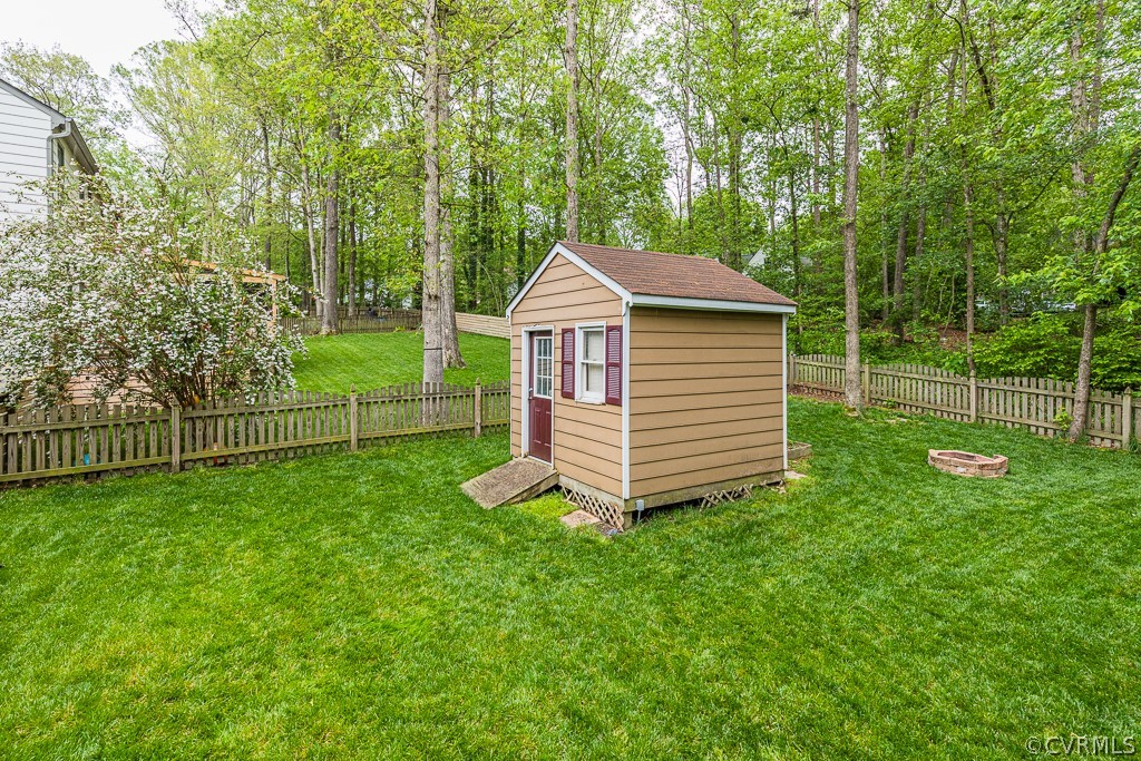 14209 Long Hill Road Midlothian, VA 23112 - Photo 46 of 50 a view of a house with backyard and a garden