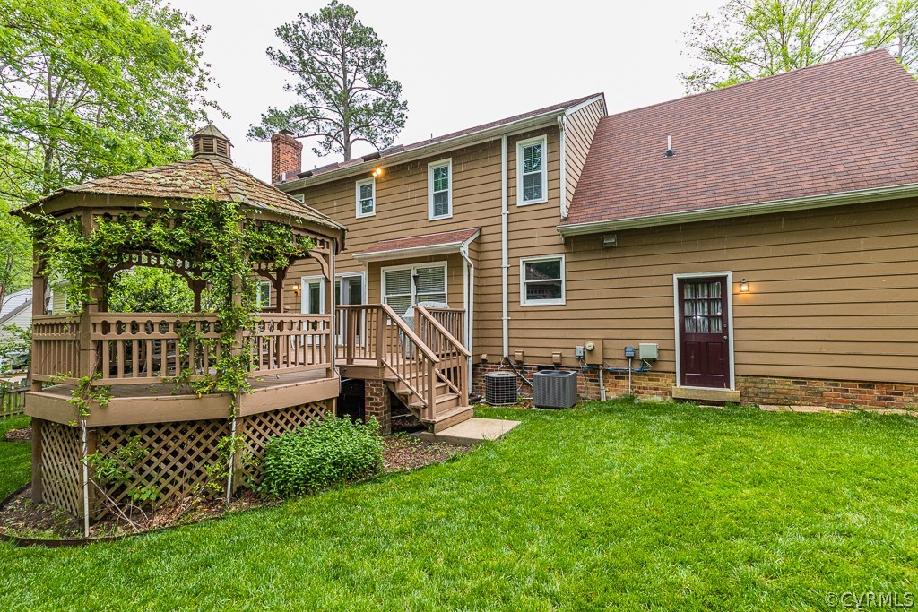 14209 Long Hill Road Midlothian, VA 23112 - Photo 47 of 50 a view of a house with a yard and deck