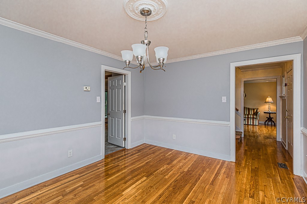 14209 Long Hill Road Midlothian, VA 23112 - Photo 9 of 50 a view of empty room with wooden floor