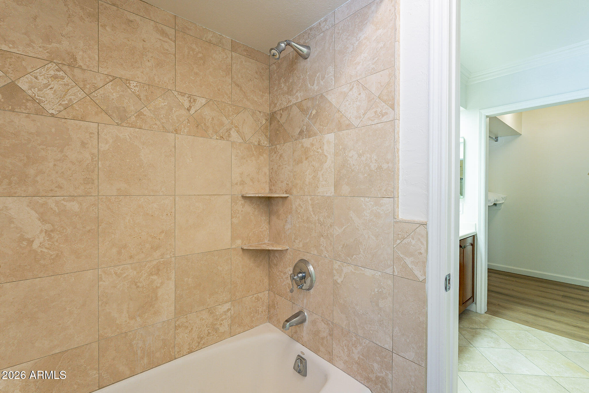 4226 East North Lane Phoenix, AZ 85028 - Photo 28 of 43 a bathroom with a bathtub and shower