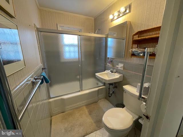 6211 Madawaska Road Bethesda, MD 20816 - Photo 16 of 24 a bathroom with a sink toilet and shower