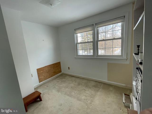 6211 Madawaska Road Bethesda, MD 20816 - Photo 19 of 24 an empty room with windows