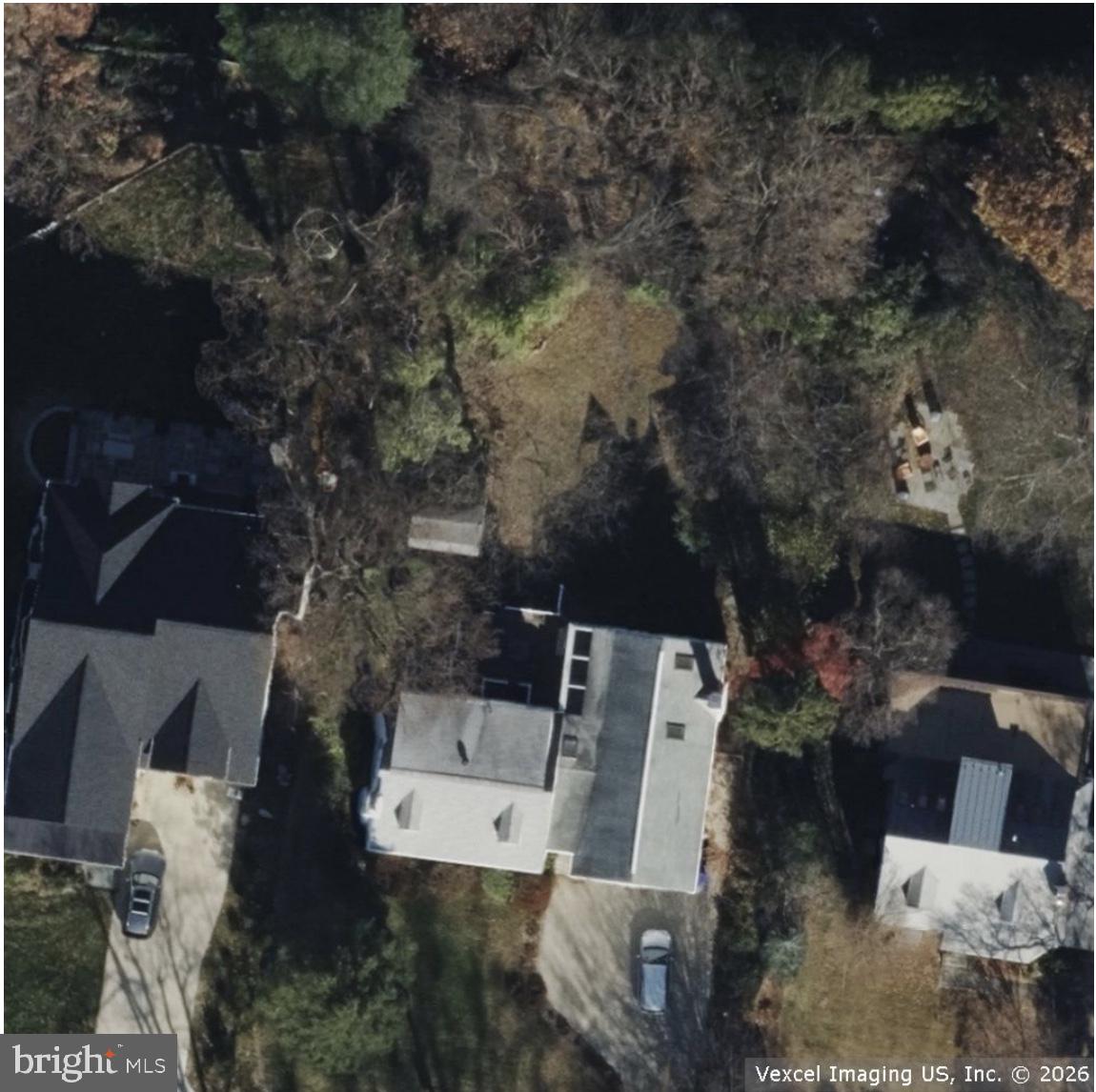 6211 Madawaska Road Bethesda, MD 20816 - Photo 2 of 24 an aerial view of a house with a yard