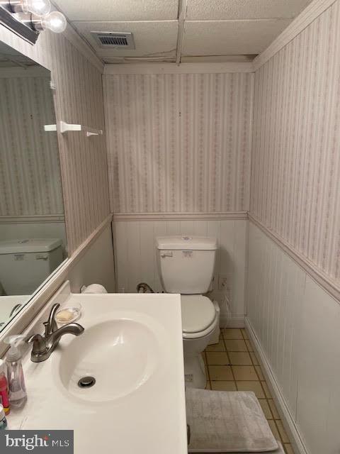 6211 Madawaska Road Bethesda, MD 20816 - Photo 23 of 24 a bathroom with a sink a toilet and shower