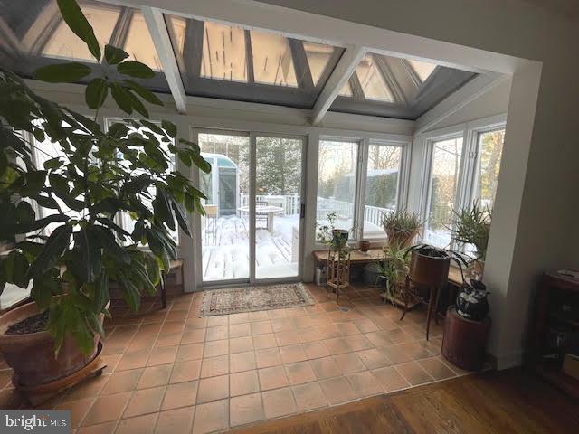 6211 Madawaska Road Bethesda, MD 20816 - Photo 8 of 24 a lobby with furniture and floor to ceiling window