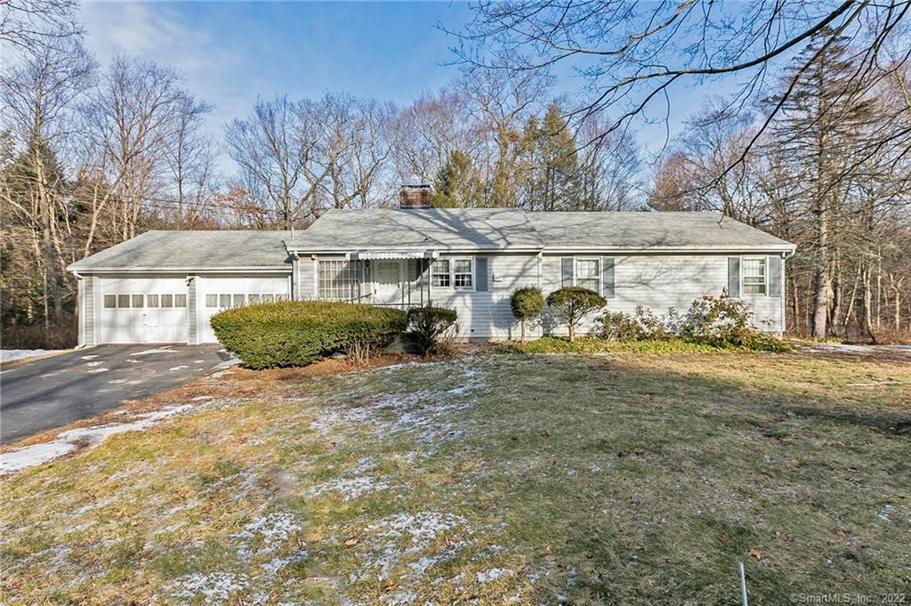 41 Longmeadow Road Shelton, CT 06484 - Photo 1 of 1 a front view of a house with garden