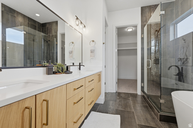 653 East Vandalay Lane Draper, UT 84020 - Photo 27 of 61 Dual vanity with light wood-finish cabinetry and white countertops