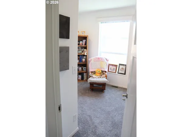 a view of a bedroom with workspace