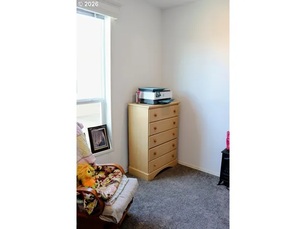a kitchen with stainless steel appliances granite countertop a stove and a microwave