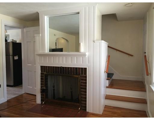 25 Hartwick Street Springfield, MA 01108 - Photo 12 of 18 a view of a livingroom with a fireplace