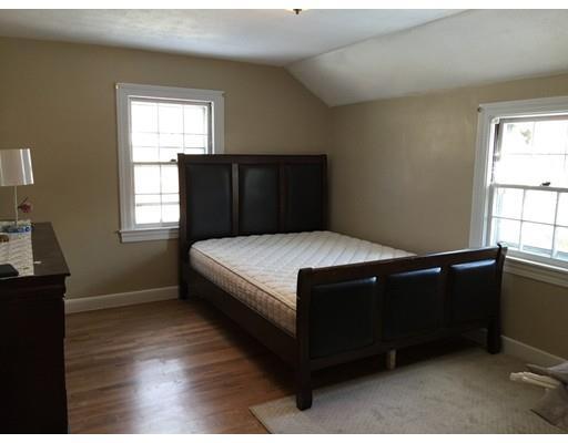 25 Hartwick Street Springfield, MA 01108 - Photo 13 of 18 a bedroom with a bed dresser and a window