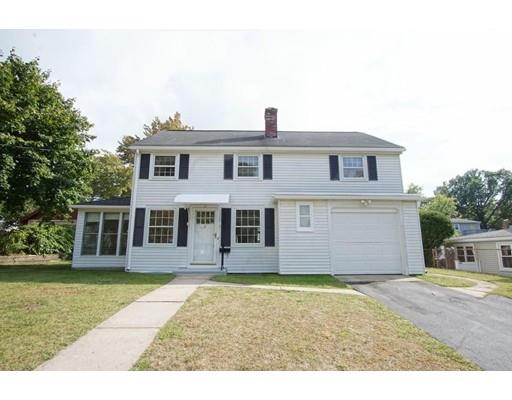 25 Hartwick Street Springfield, MA 01108 - Photo 2 of 18 a front view of a house with a garden