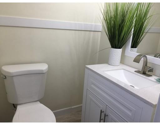25 Hartwick Street Springfield, MA 01108 - Photo 6 of 18 a bathroom with a toilet and a sink