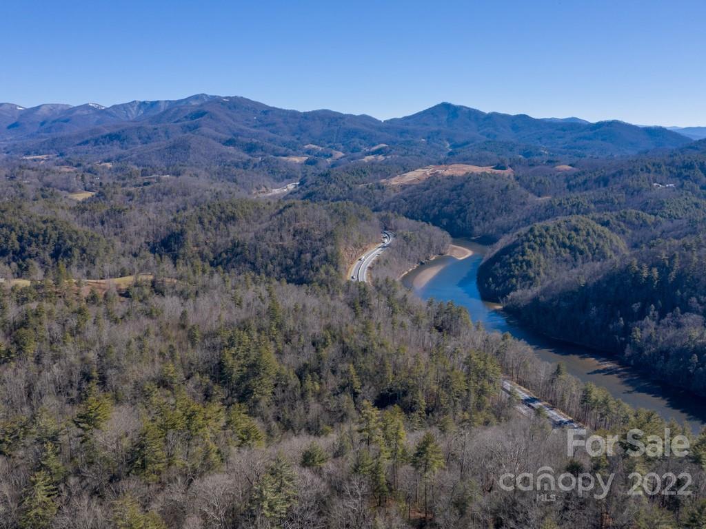 0 Shelton Laurel Road, Unit 1 Clyde, NC 28721 - Photo 7 of 20 a view of a lush green hillside and a mountain