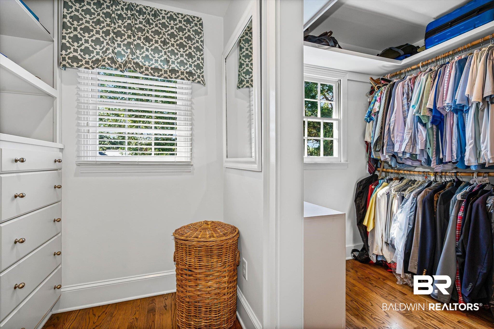 513 Spring Park Drive East Mobile, AL 36608 - Photo 25 of 44 Walk in closet featuring dark wood-style floors