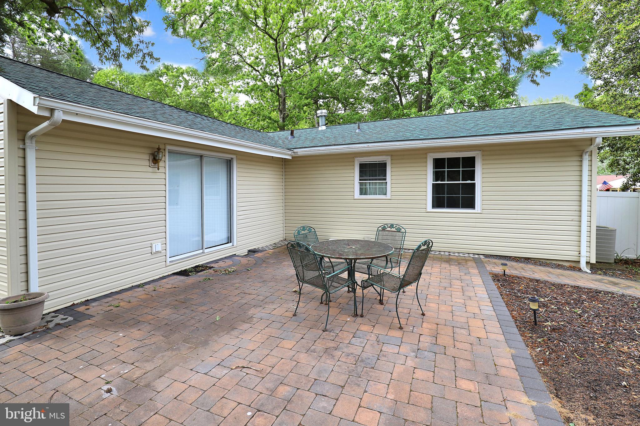 22012 Fox Ridge Road Lexington Park, MD 20653 - Photo 35 of 36 HARDSCAPE PATIO OFF OF FAMILY ROOM