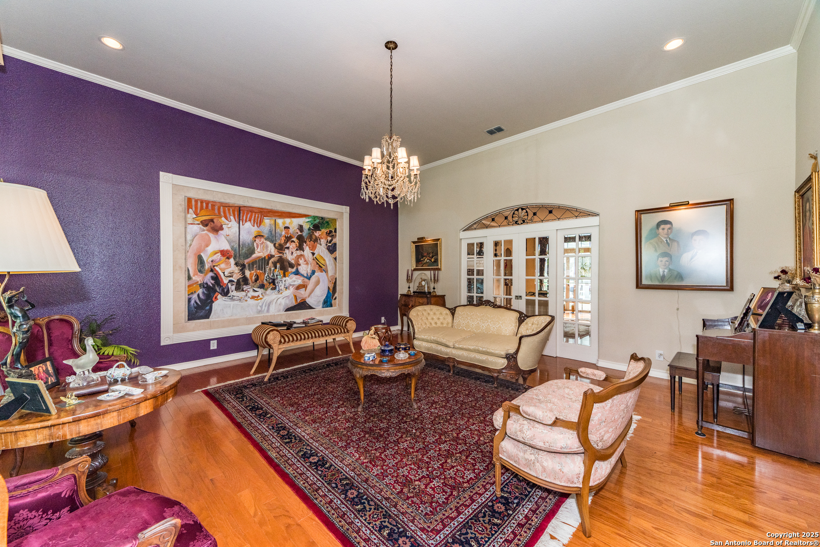 7226 North Vandiver Road San Antonio, TX 78209 - Photo 12 of 59 a living room with furniture and a chandelier