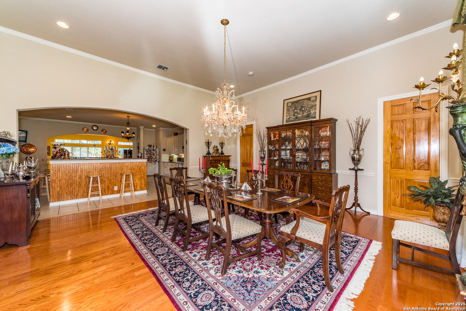 7226 North Vandiver Road San Antonio, TX 78209 - Photo 16 of 59 a view of a dining room with furniture window and wooden floor