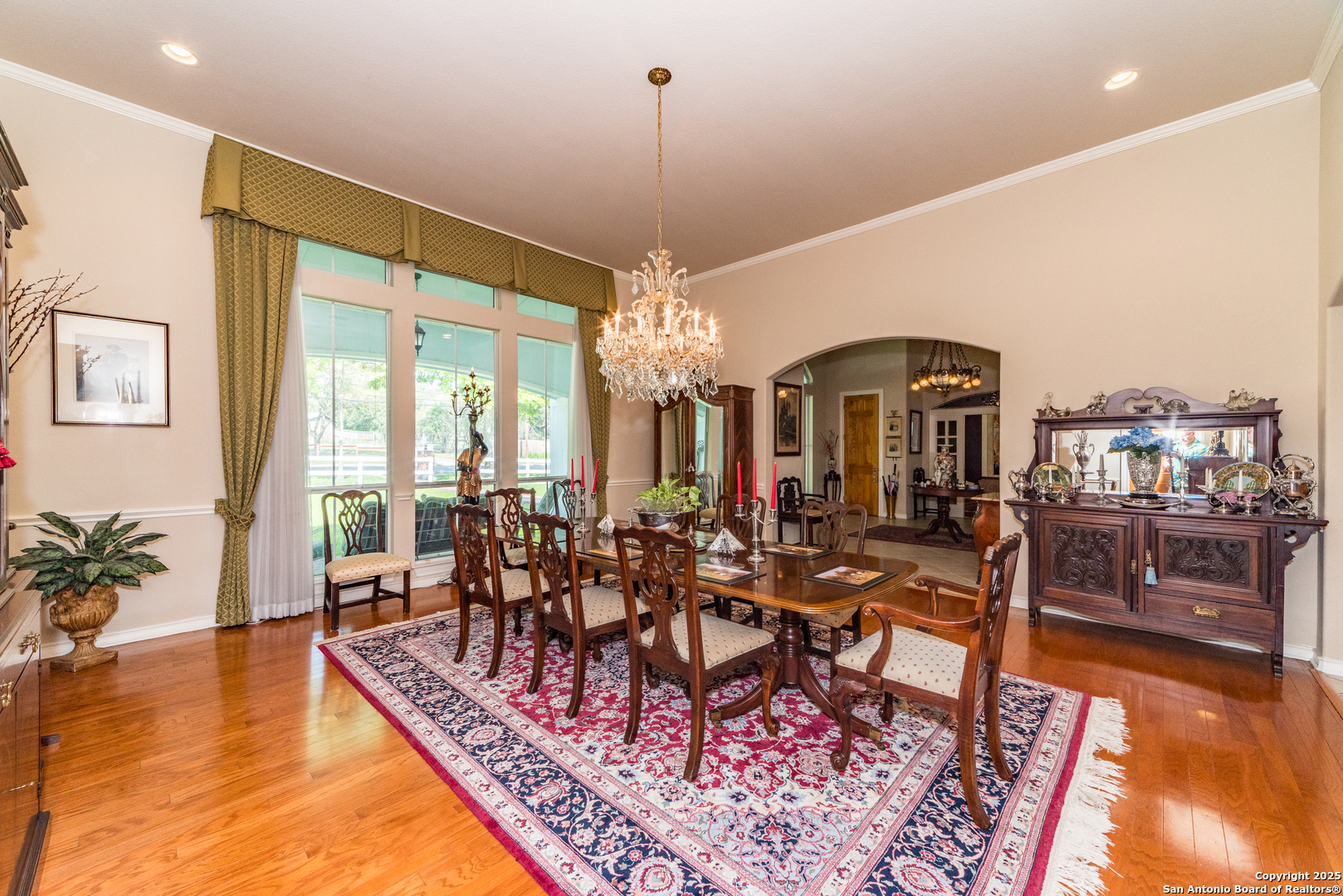 7226 North Vandiver Road San Antonio, TX 78209 - Photo 18 of 59 a view of a dining room with furniture window and wooden floor