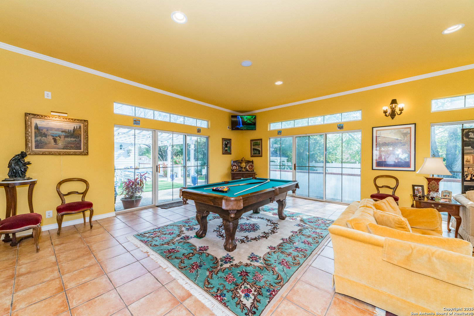 7226 North Vandiver Road San Antonio, TX 78209 - Photo 29 of 59 a living room with furniture and a flat screen tv