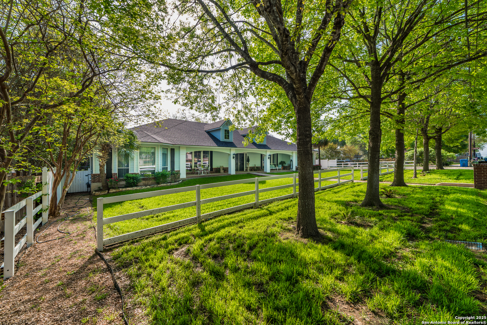 7226 North Vandiver Road San Antonio, TX 78209 - Photo 3 of 59 a view of a house with a yard