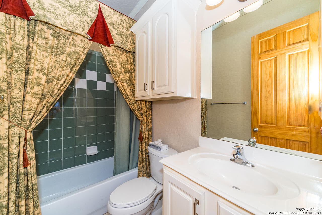 7226 North Vandiver Road San Antonio, TX 78209 - Photo 46 of 59 a bathroom with a sink toilet and shower