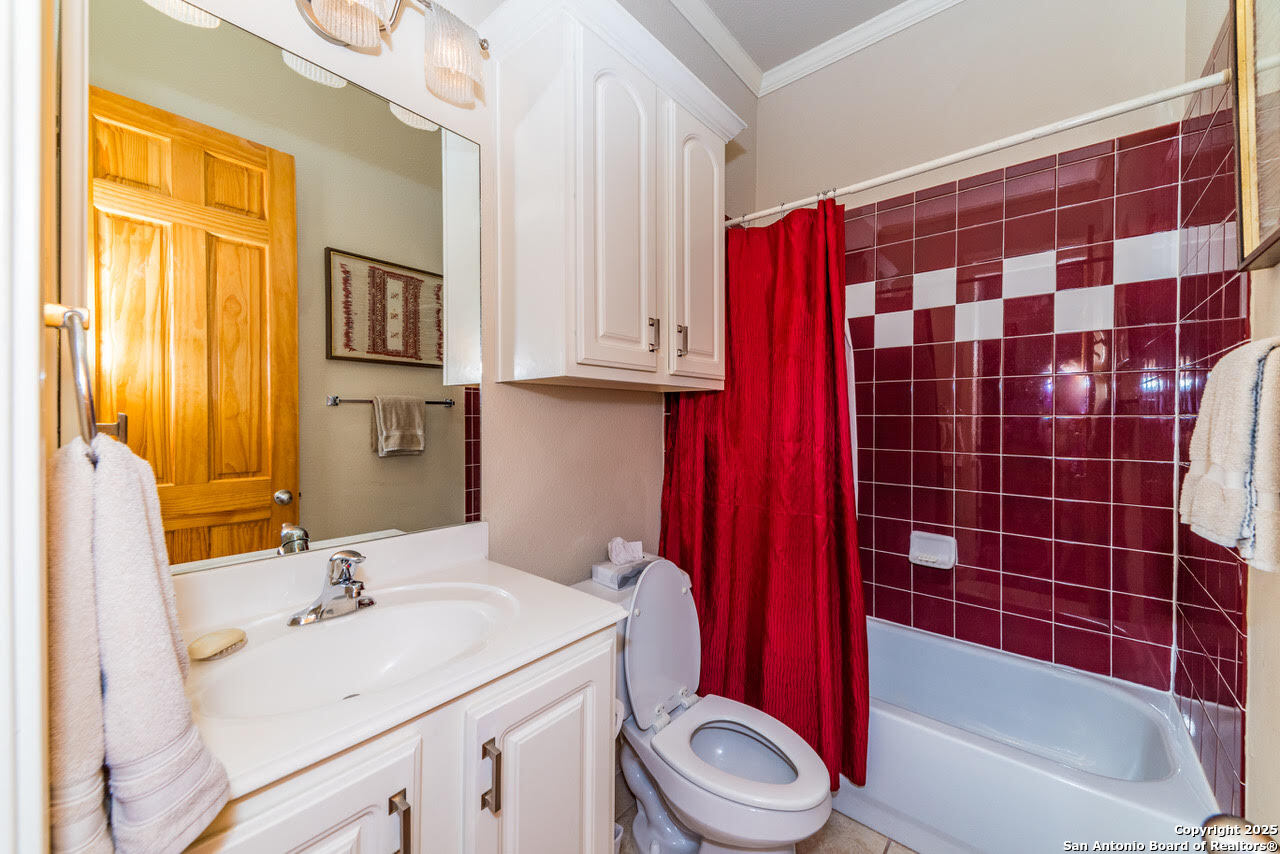 7226 North Vandiver Road San Antonio, TX 78209 - Photo 48 of 59 a bathroom with a sink toilet and shower