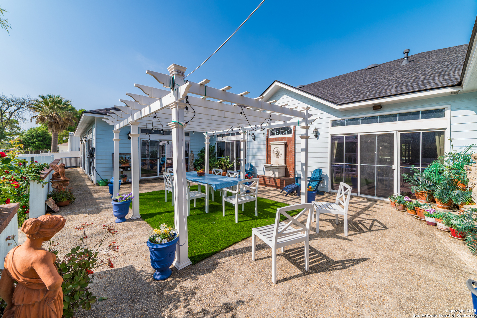 7226 North Vandiver Road San Antonio, TX 78209 - Photo 51 of 59 a view of a house with backyard porch and sitting area