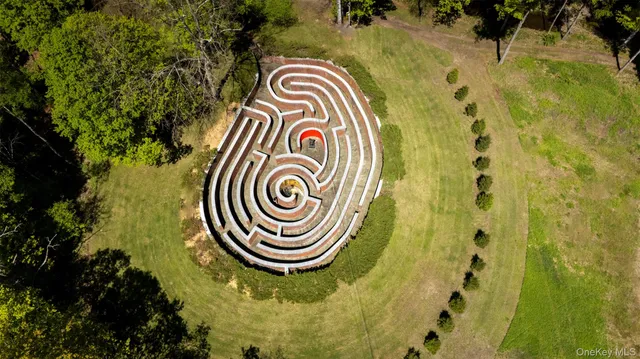 a view of a swimming pool with a balcony