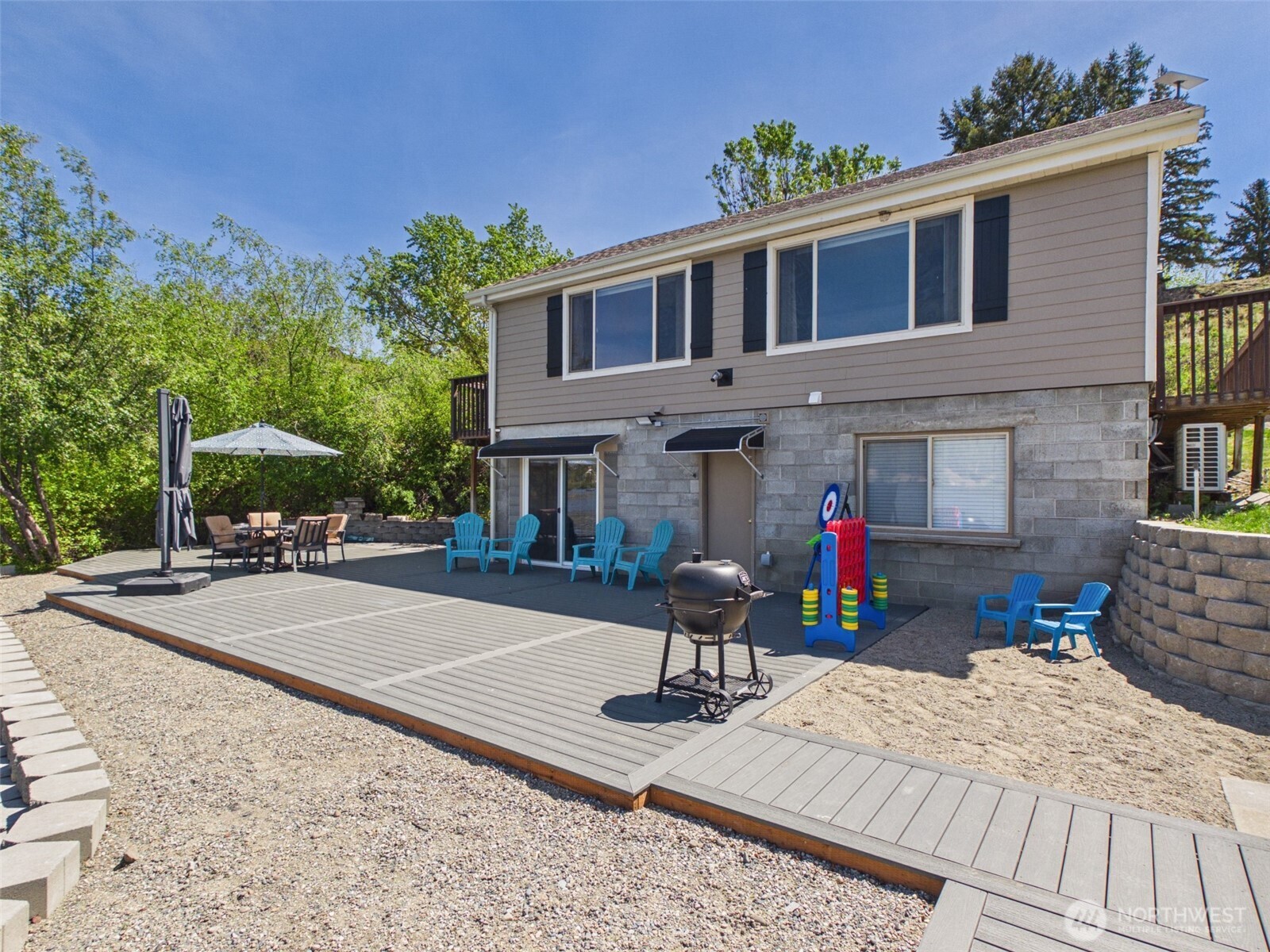 6 Marions Cove Road Republic, WA 99166 - Photo 21 of 33 a front view of a house with yard and seating area