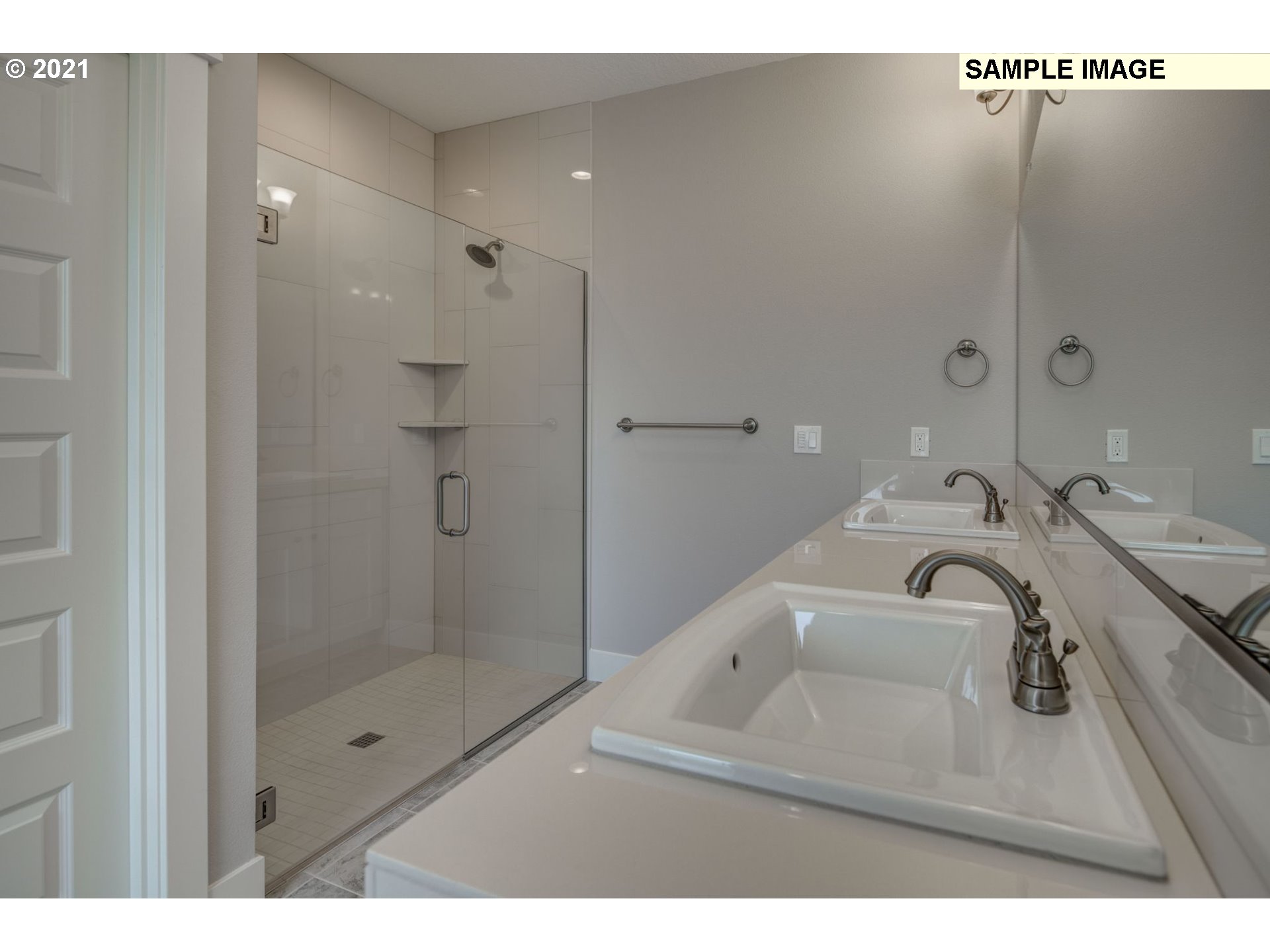 South Harper Valley Way Ridgefield, WA 98642 - Photo 14 of 24 a bathroom with a sink mirror and shower
