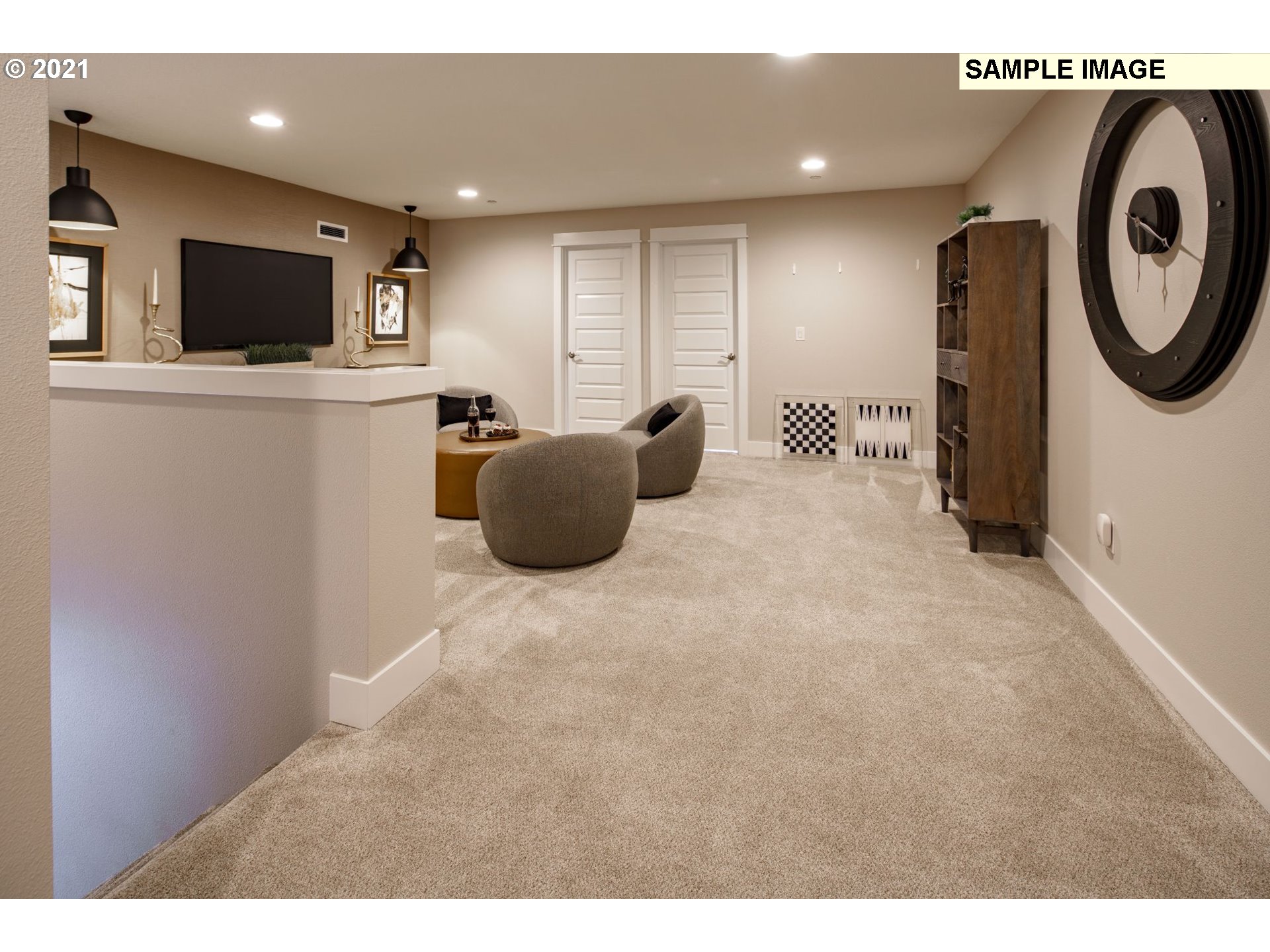 South Harper Valley Way Ridgefield, WA 98642 - Photo 22 of 24 a living room with furniture and a flat screen tv