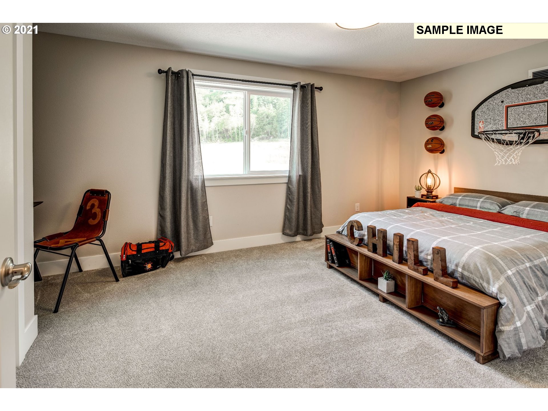 South Harper Valley Way Ridgefield, WA 98642 - Photo 23 of 24 a bedroom with a bed chair and a window