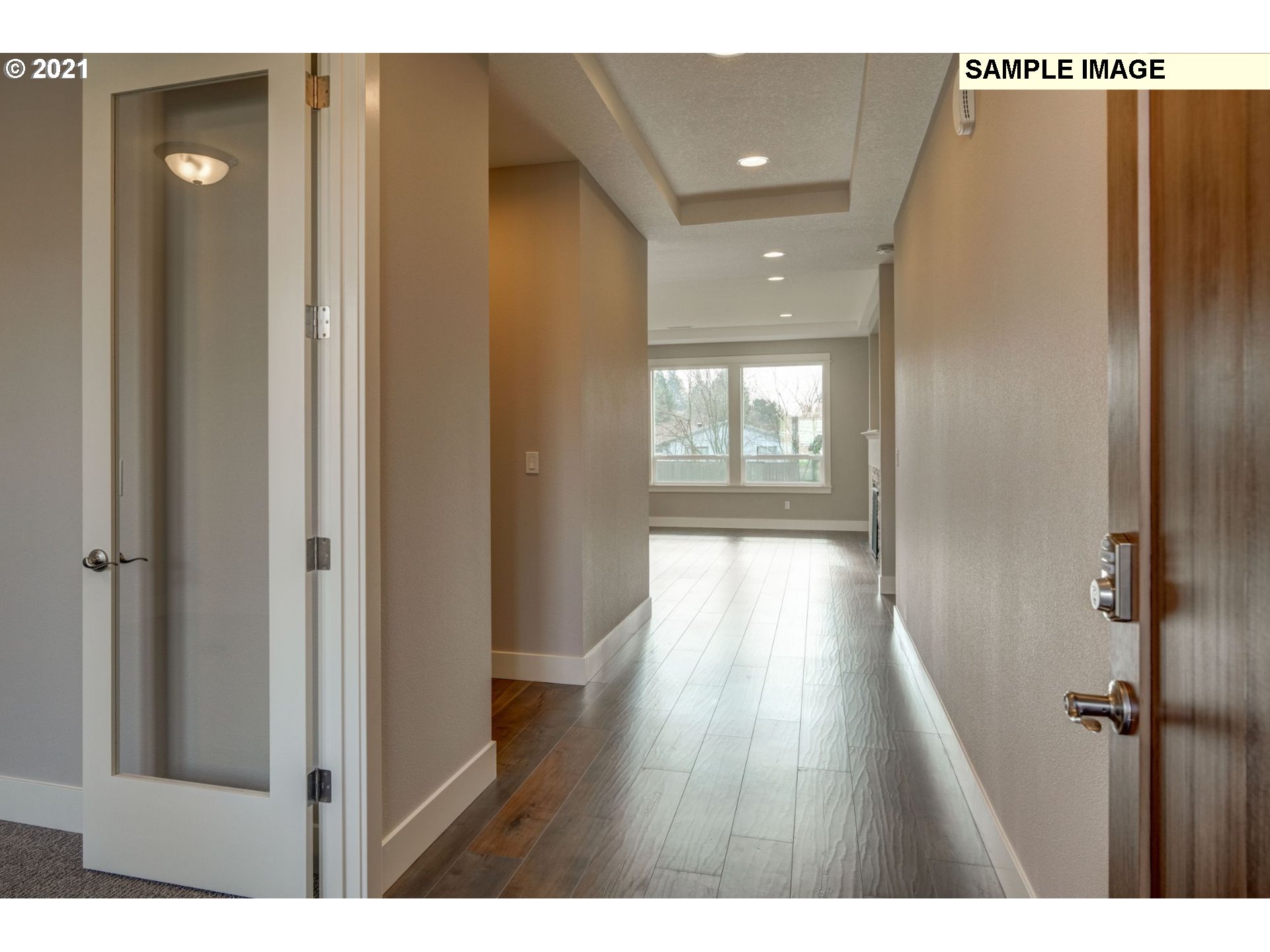 South Harper Valley Way Ridgefield, WA 98642 - Photo 4 of 24 a view of hallway with wooden floor