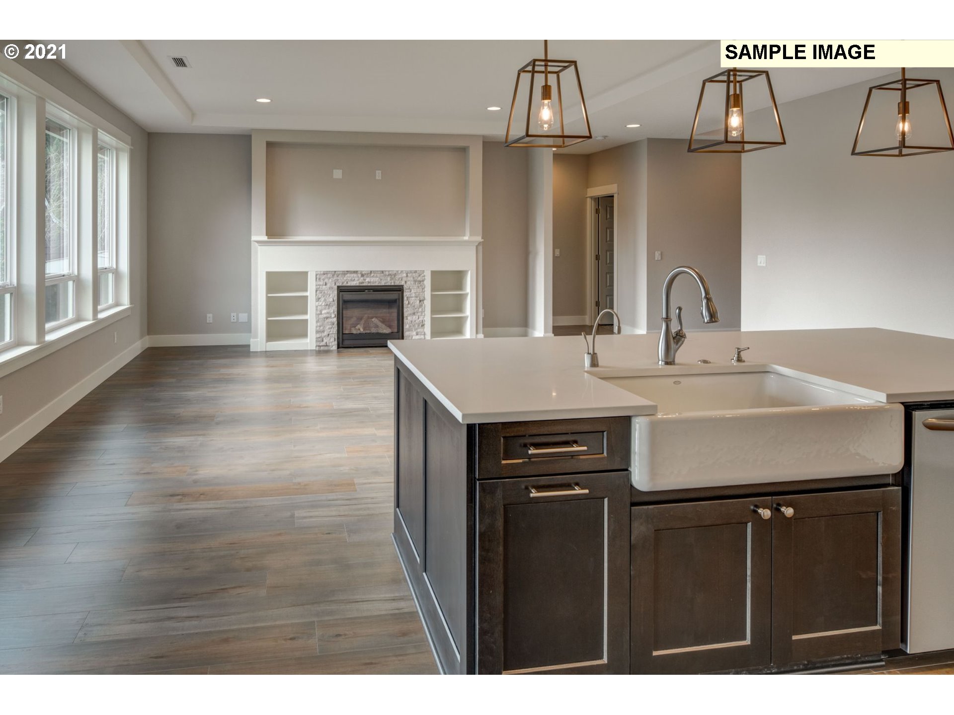 South Harper Valley Way Ridgefield, WA 98642 - Photo 9 of 24 a kitchen with a sink cabinets and a fireplace