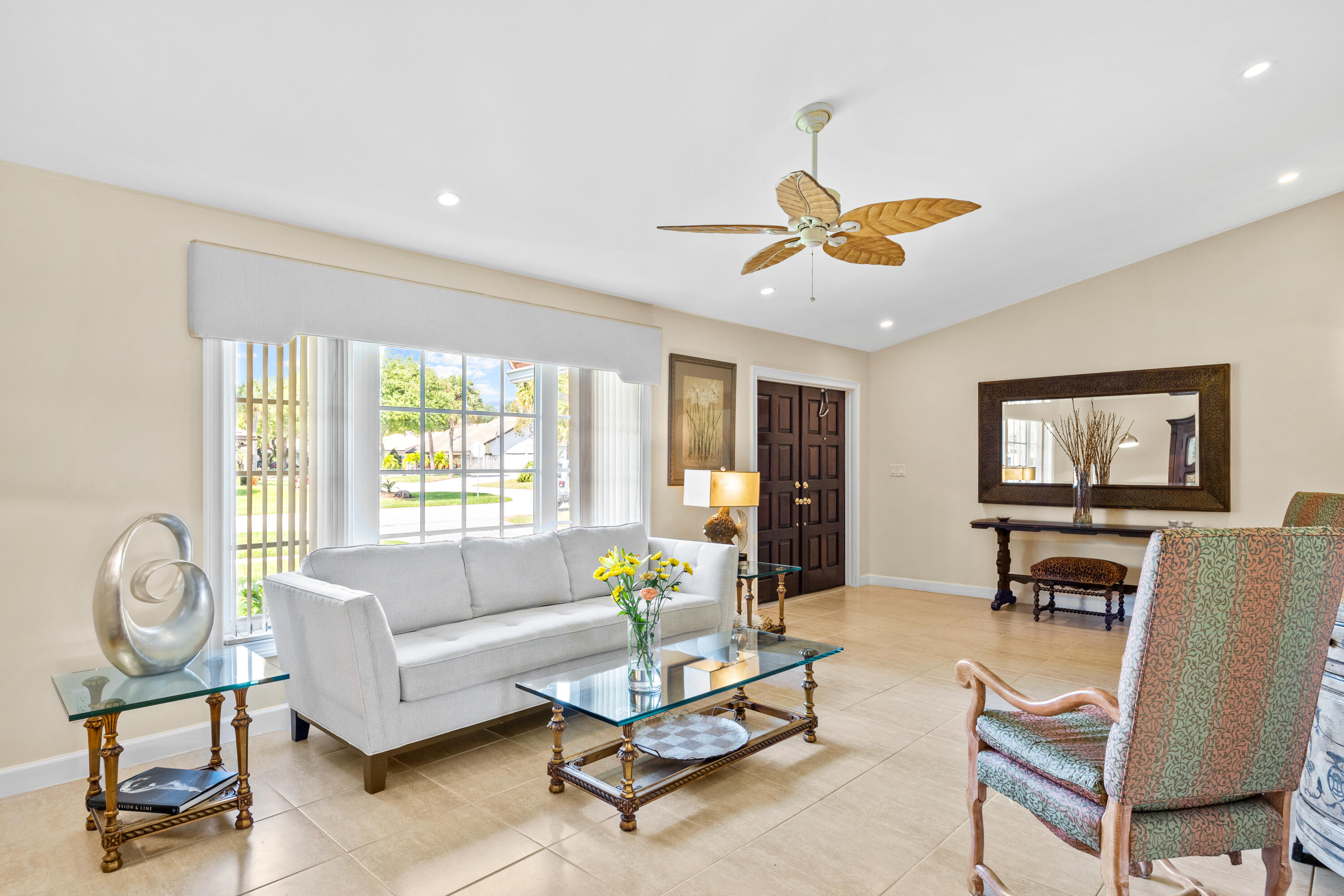 2136 Southwest 8th Avenue Boca Raton, FL 33486 - Photo 3 of 23 a living room with furniture a table and a large window