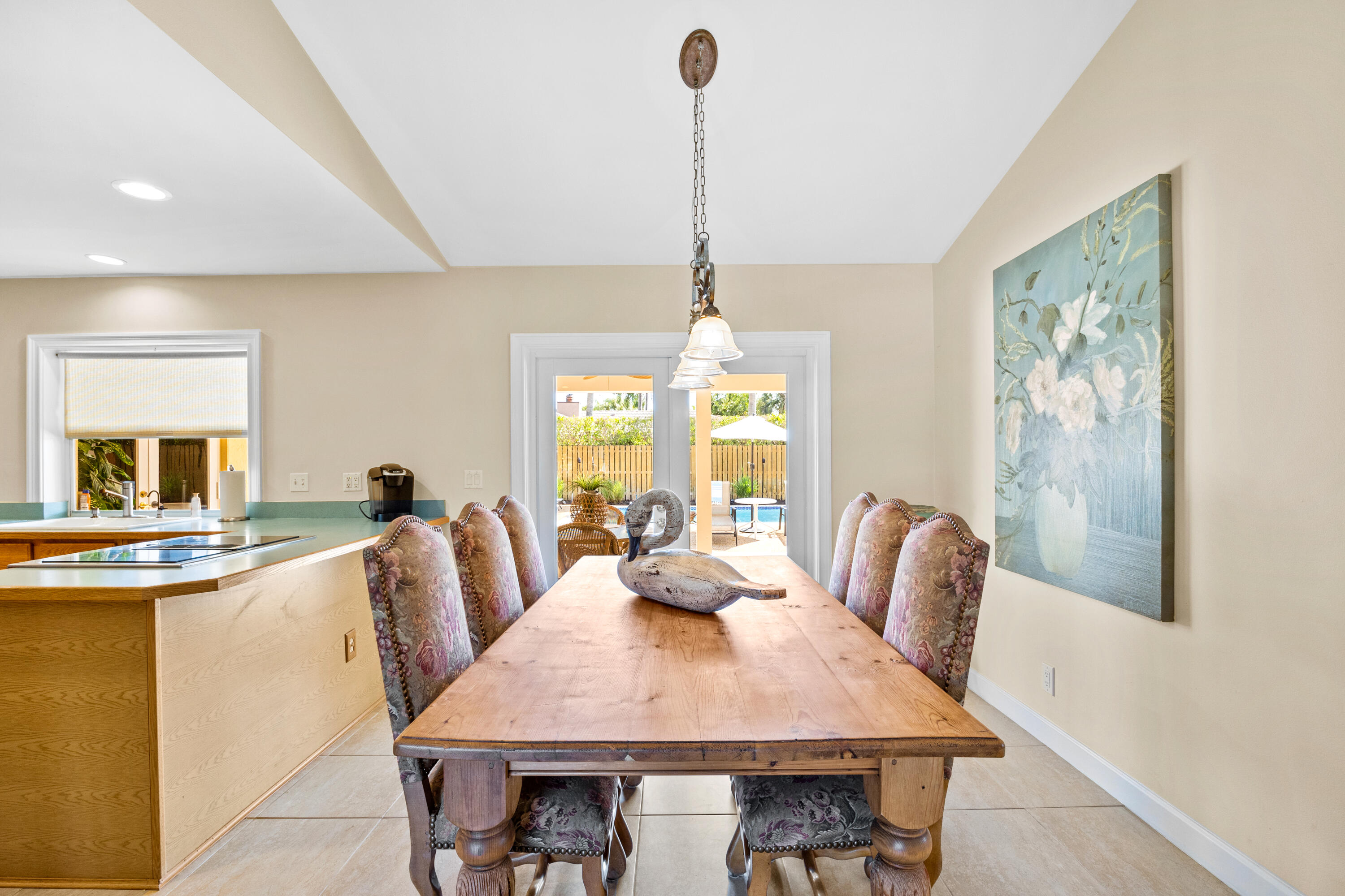 2136 Southwest 8th Avenue Boca Raton, FL 33486 - Photo 7 of 23 a view of a dining room with furniture window and wooden floor
