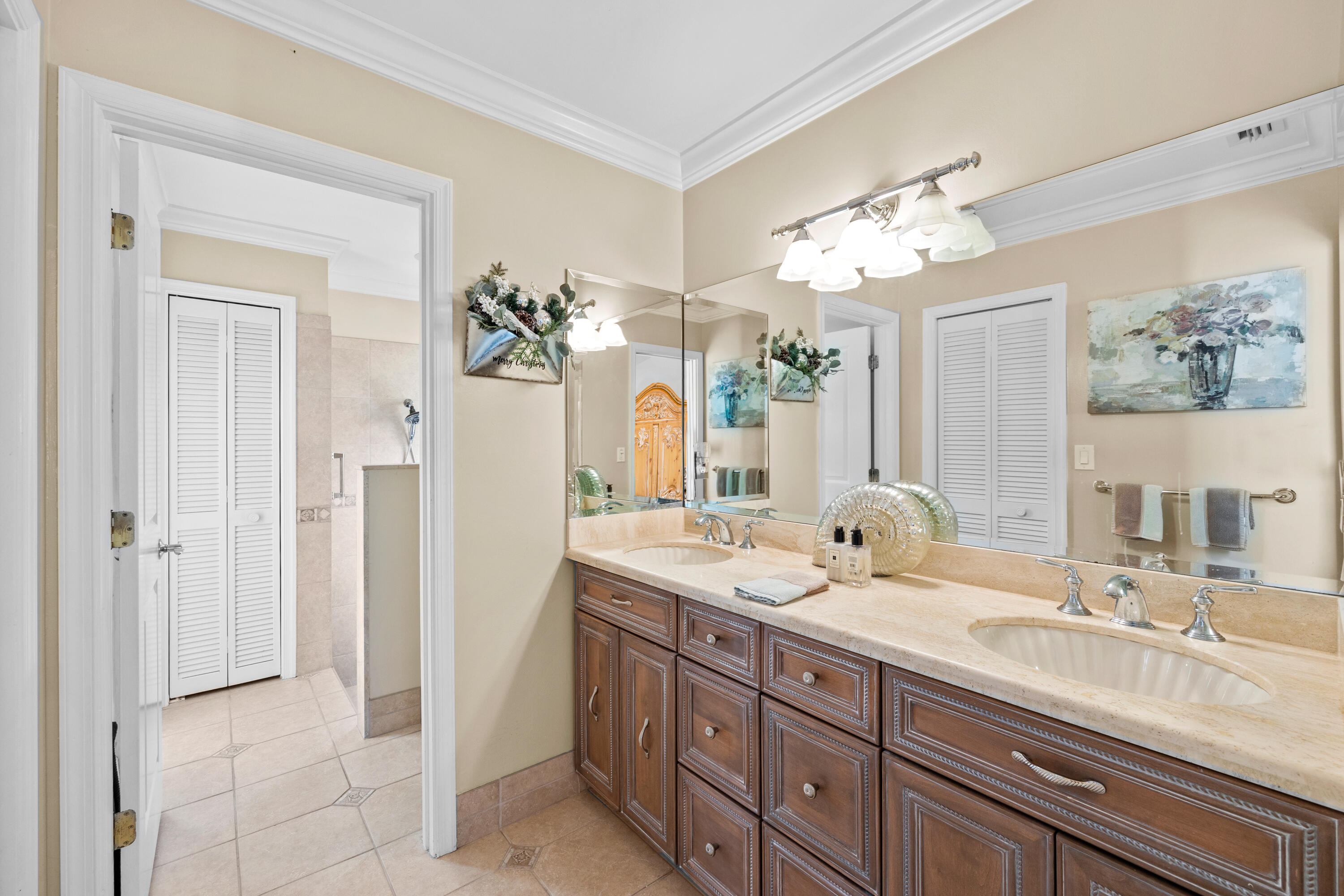 2136 Southwest 8th Avenue Boca Raton, FL 33486 - Photo 9 of 23 a bathroom with a double vanity sink and a mirror