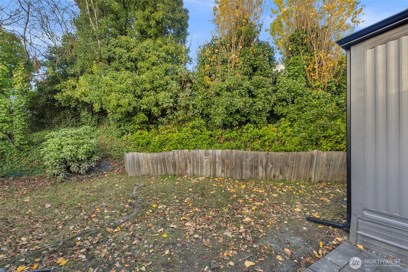 14322 Admiralty Way, Unit 8 Lynnwood, WA 98087 - Photo 21 of 21 a view of a large body of water with a large tree