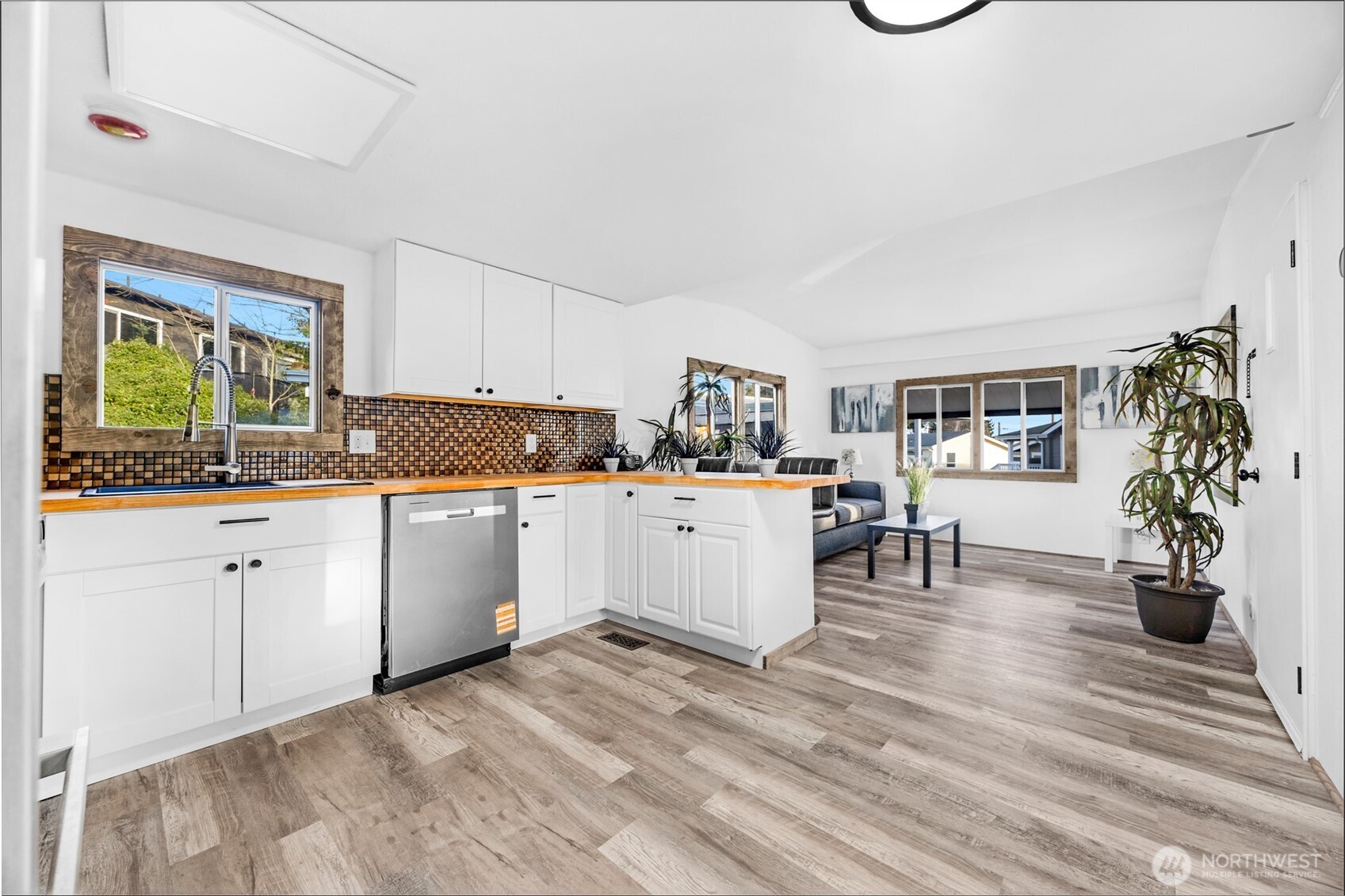 14322 Admiralty Way, Unit 8 Lynnwood, WA 98087 - Photo 6 of 21 a kitchen with sink and cabinets