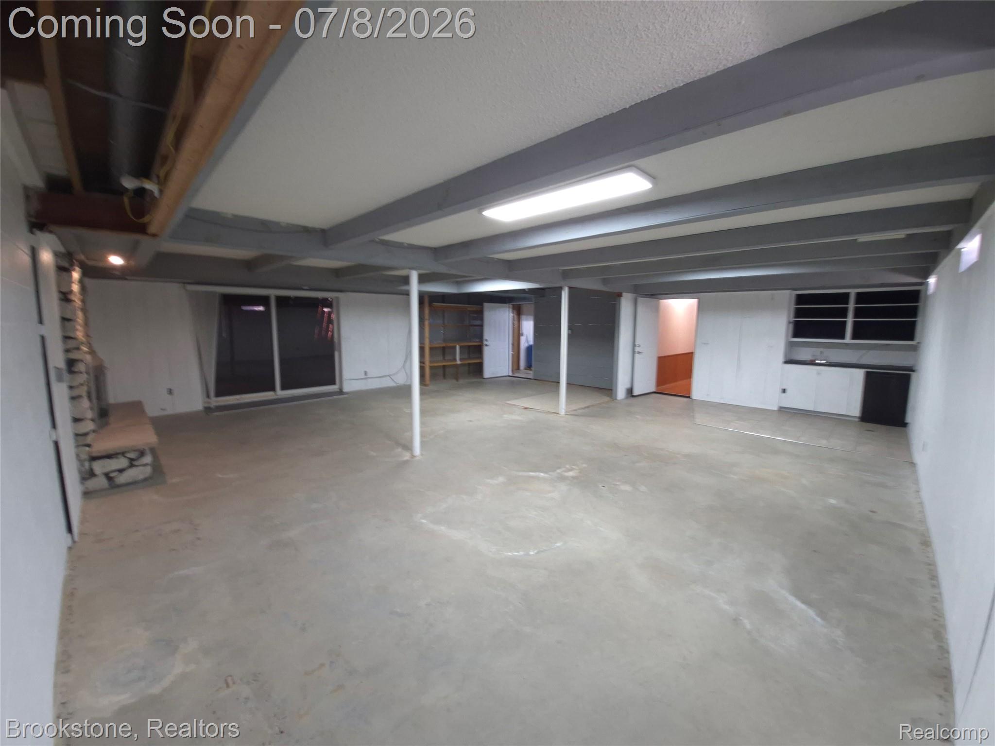 4140 South Henderson Road Davison, MI 48423 - Photo 75 of 98 Expansive lower level featuring concrete flooring, exposed ceiling beams, and recessed lighting