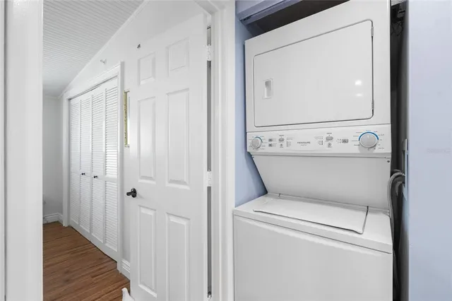 a bathroom with a toilet a sink and a mirror