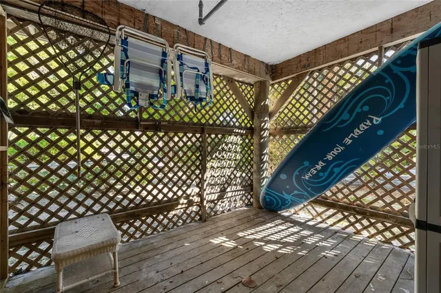 a view of wooden staircase with wooden fence